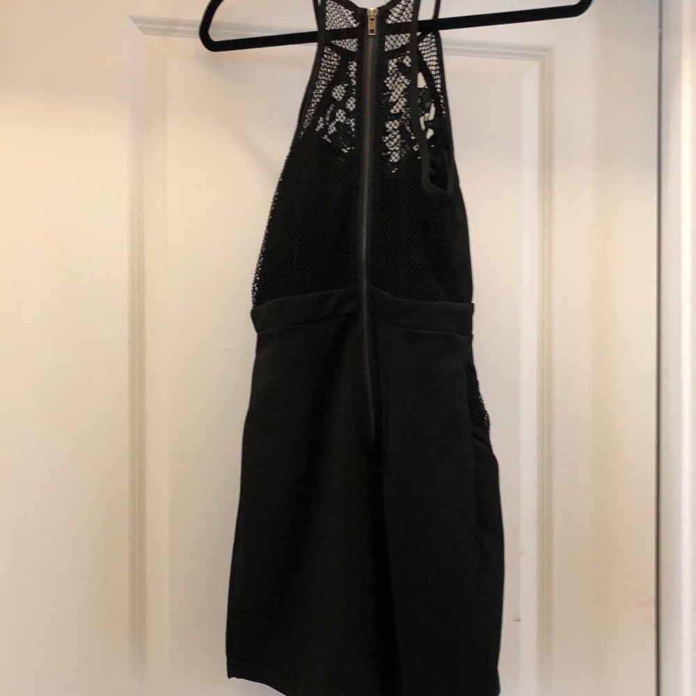 Black mini dress, Never worn out. Tag on. Size M.